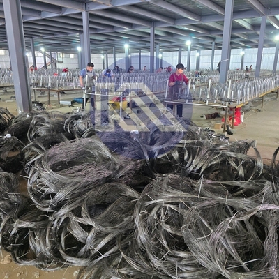 Penghalang yang tidak mencolok Pagar penghalang keamanan MZP Tangle 10x5x1.4 Wire Mesh Penghalang Anti Tank Wire In Garland Woven into Rings